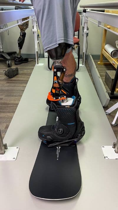snow sports snowboarding prosthetic device